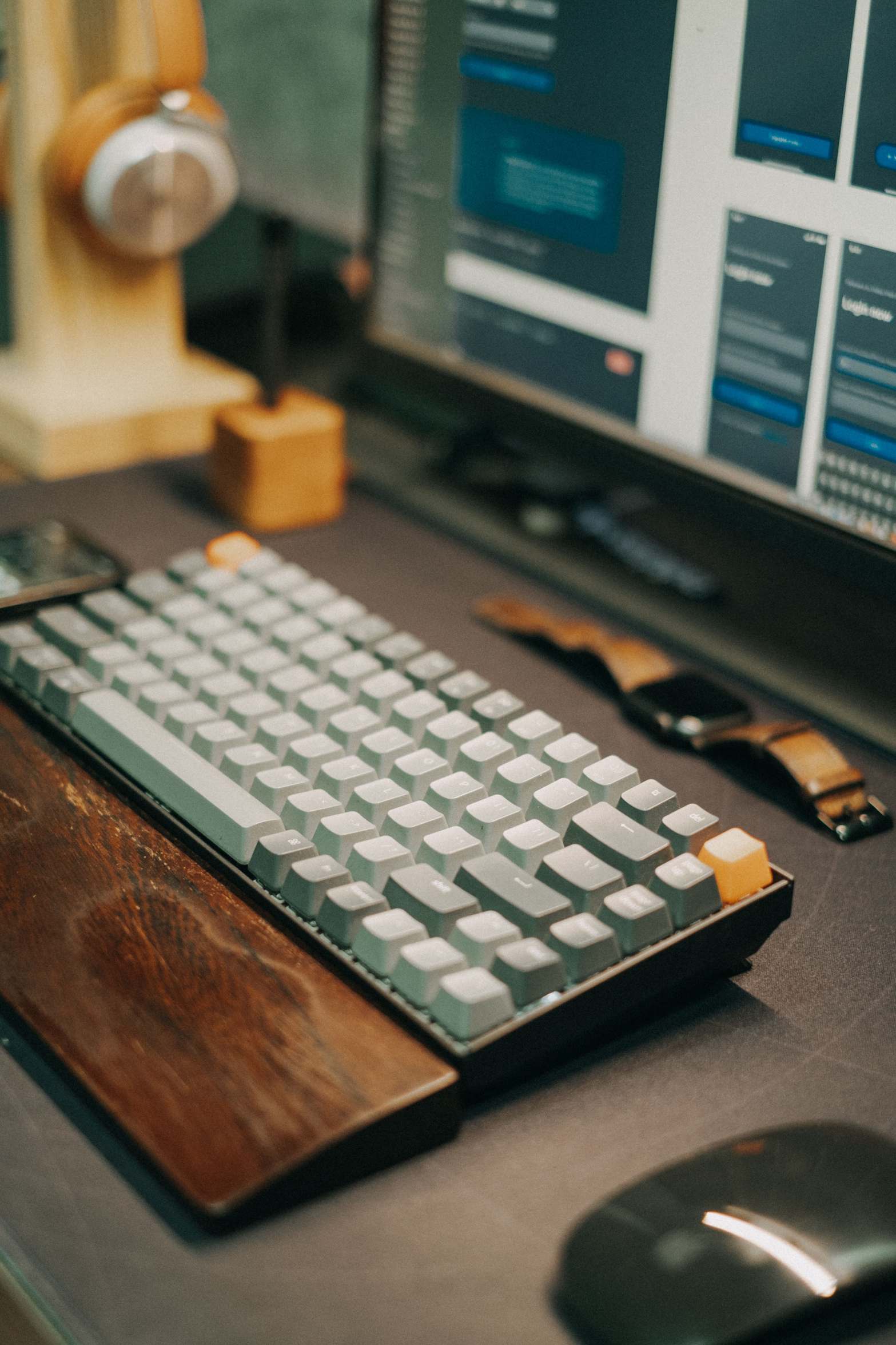 Overhead view of a mechanical keyboard on a modern workspace desk